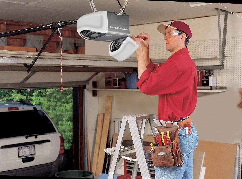 A&E technician installing a garage door opener